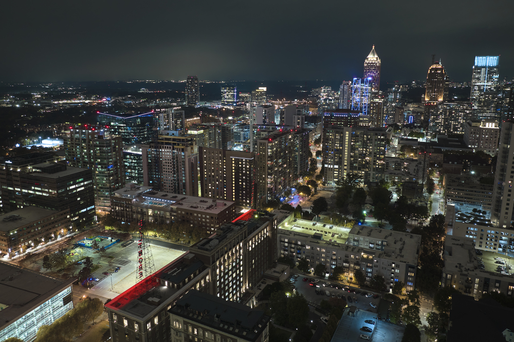 night urban landscape of downtown district of atlanta city in georgia, usa. skyline with brightly illuminated high skyscraper buildings in modern american megapolis